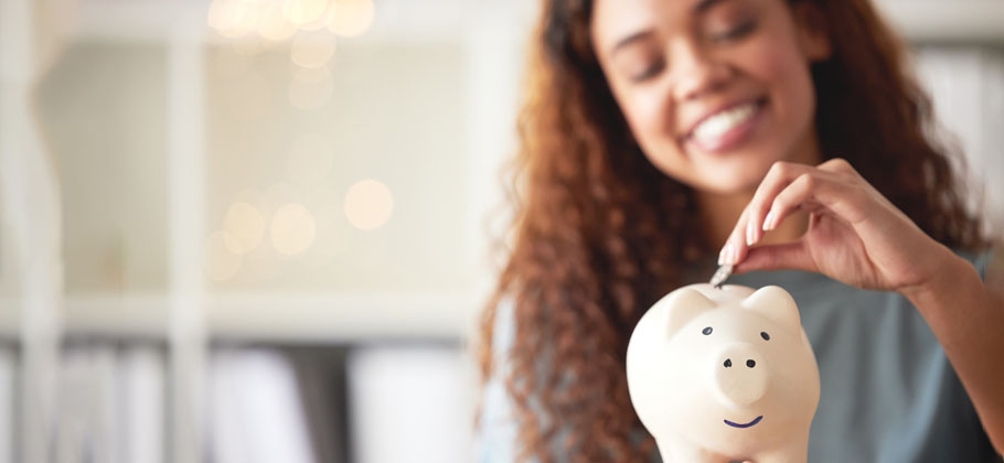 image showing cash accounting and woman investing coins in a funds jar